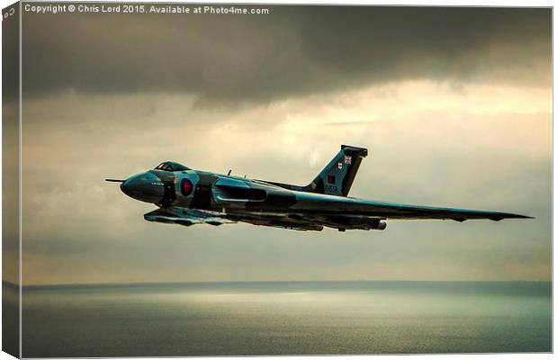   Vulcan XH558 Over The Sea Canvas Print by Chris Lord