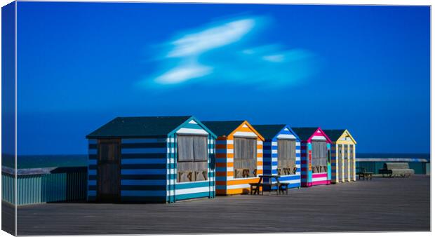 Beach Huts At Hastings Canvas Print by Chris Lord
