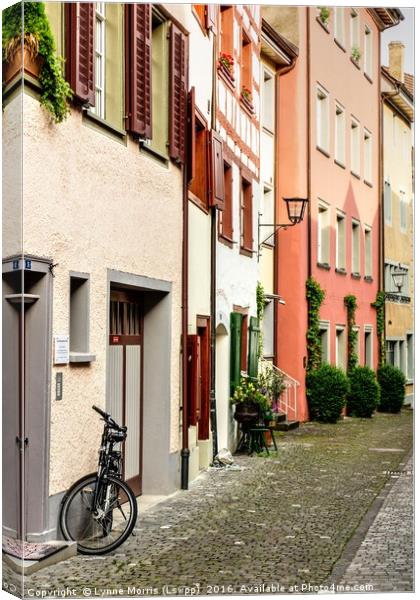 Back streets and a bike Canvas Print by Lynne Morris (Lswpp)