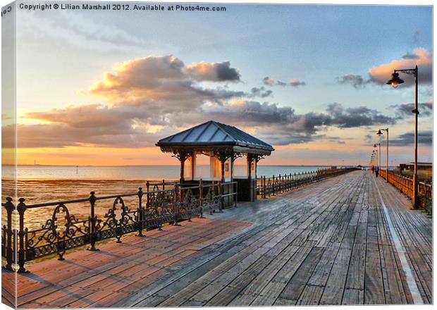Sunset on the Pier Canvas Print by Lilian Marshall