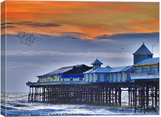 Starlings over Central Pier. Canvas Print by Lilian Marshall