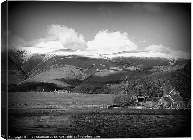 Snow capped mountains at Keswick. Canvas Print by Lilian Marshall