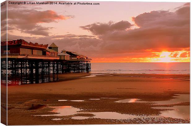 Sunset on South Pier. Canvas Print by Lilian Marshall