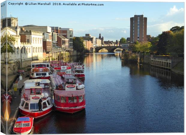 Pleasure boats moored at York.  Canvas Print by Lilian Marshall