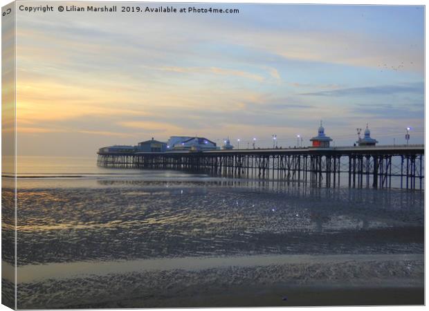 Sunset over North Pier. Blackpool in Lancashire.  Canvas Print by Lilian Marshall