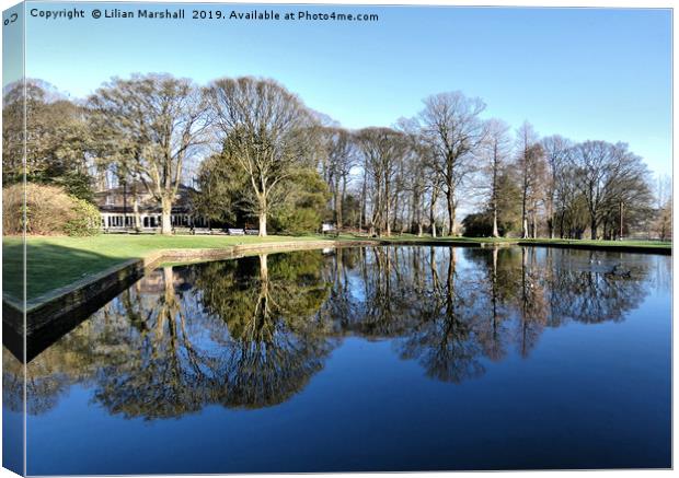Reflections in Towneley Park.  Canvas Print by Lilian Marshall