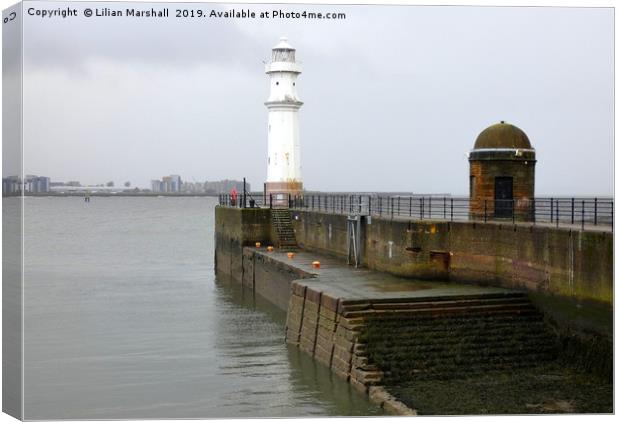 Misty Newhaven Lighthouse.  Canvas Print by Lilian Marshall