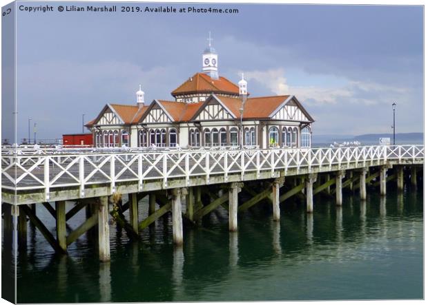 Grey skies over Dunoon Pier. Scotland. Canvas Print by Lilian Marshall