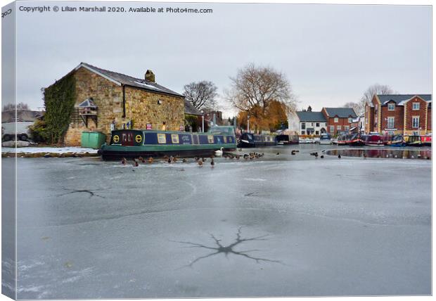 Frozen Lancaster Canal at Garstang.  Canvas Print by Lilian Marshall