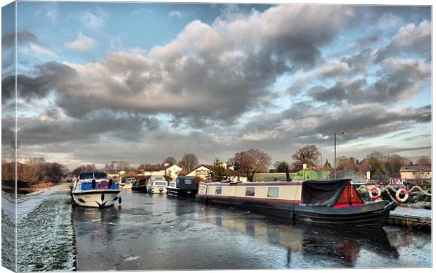 Frozen Lancaster canal Canvas Print by Lilian Marshall