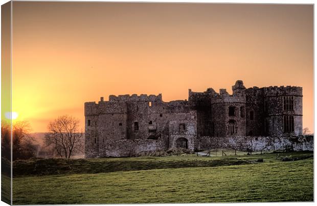 Sunset over Carew Castle Canvas Print by Steve Purnell