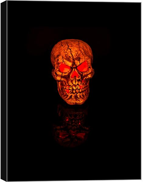 Glowing Halloween Skull Reflecting Evil Canvas Print by Steve Purnell