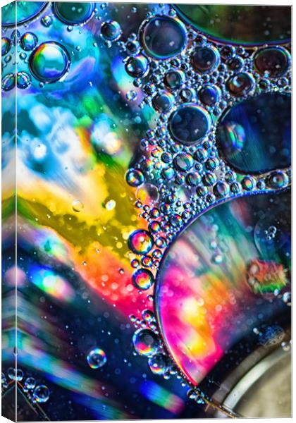 Oil On Water 3 Canvas Print by Steve Purnell