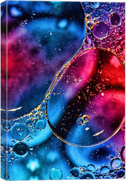 Oil On Water 5 Canvas Print by Steve Purnell