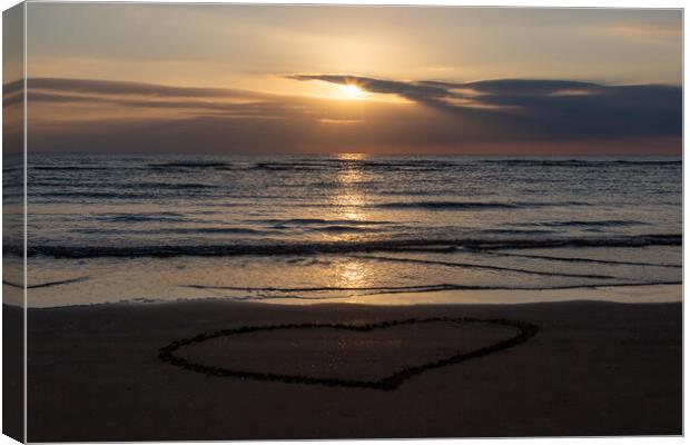 Love on the Beach Canvas Print by Roger Green
