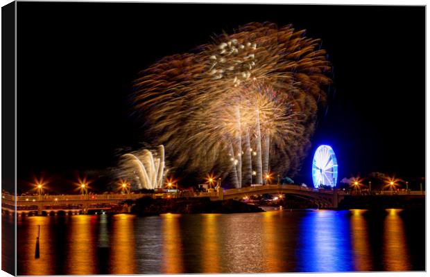Firework Display Canvas Print by Roger Green