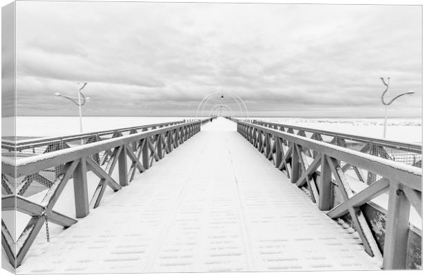Southport Pier in the Snow Canvas Print by Roger Green