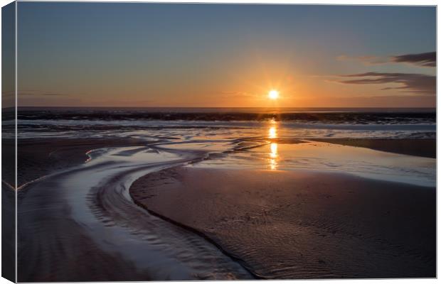 Sunset on Ainsdale Beach Canvas Print by Roger Green