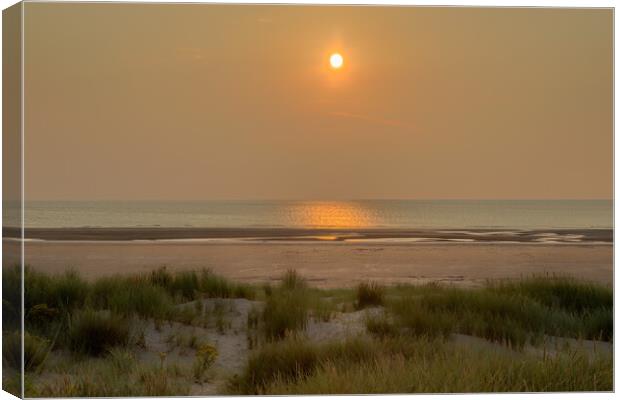Sunset on Ainsdale Beach Canvas Print by Roger Green