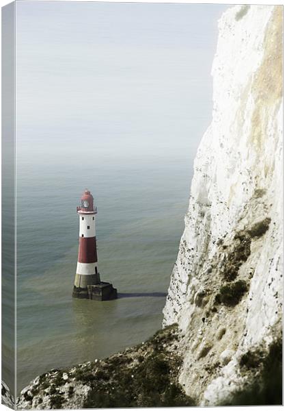 Misty lighthouse Canvas Print by Richard Thomas