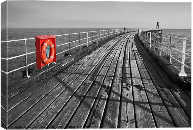 Along Whitby pier Canvas Print by Stephen Wakefield