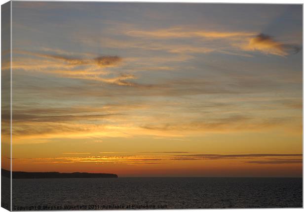 Sunrise over Flamborough Head Canvas Print by Stephen Wakefield