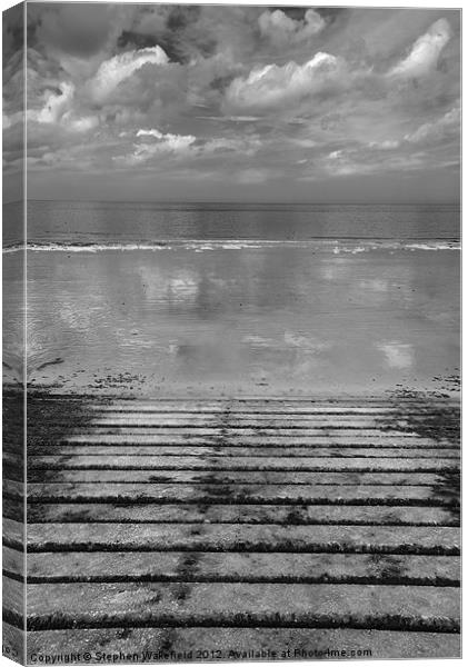 Reflections in the sand Canvas Print by Stephen Wakefield