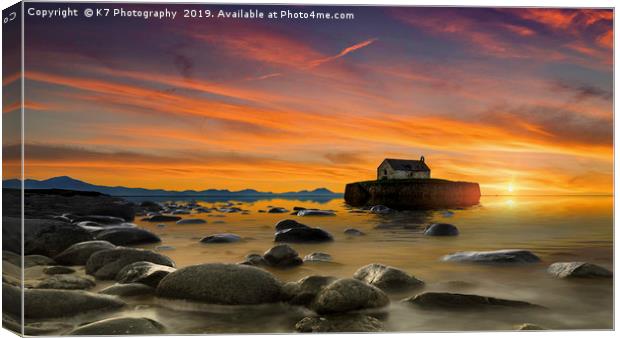 Sunset over St Cwyfan's Church, Anglesey. Canvas Print by K7 Photography