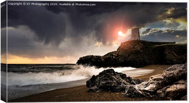 Majestic Llanddwyn Lighthouse amidst a Stormy Sky Canvas Print by K7 Photography