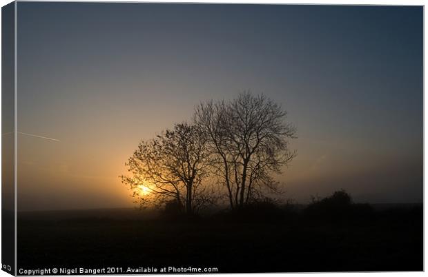 Misty Sunset. Canvas Print by Nigel Bangert