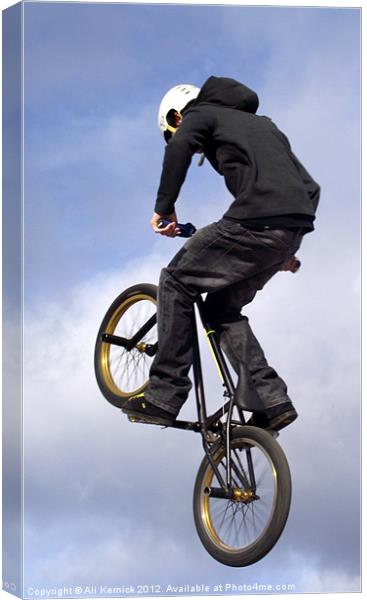 Bike Stunt rider Canvas Print by Ali Kernick