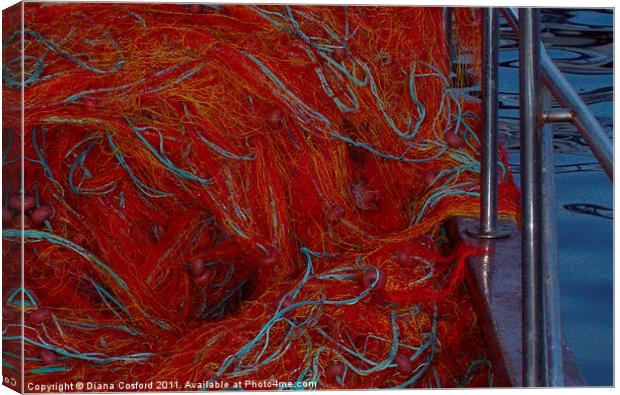 Red fishing nets over railings Canvas Print by DEE- Diana Cosford
