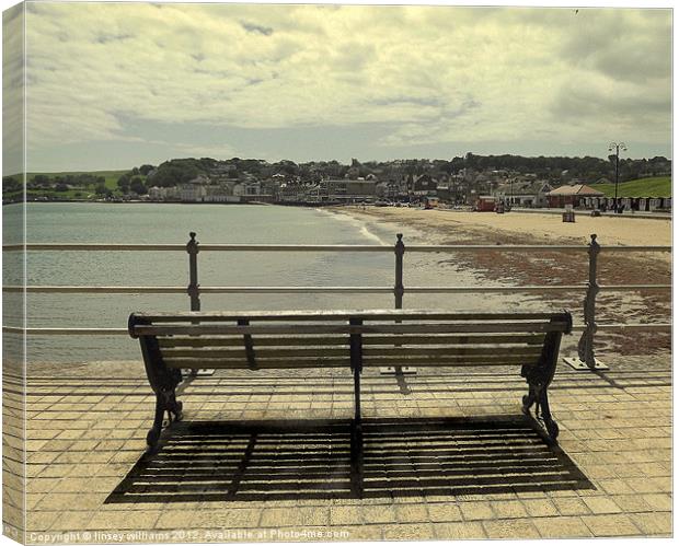 Bench on the jetty Canvas Print by Linsey Williams