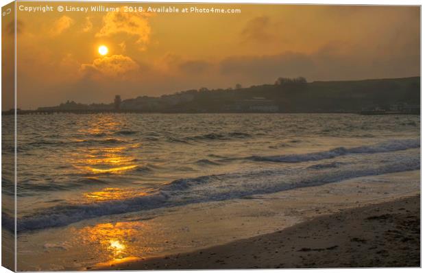 Sunrise over Swanage Bay Canvas Print by Linsey Williams