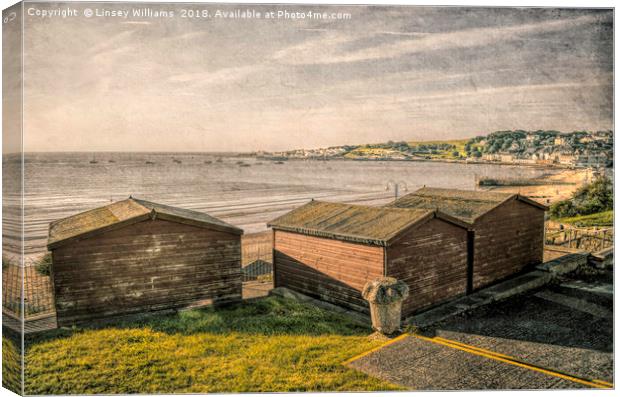 Swanage Beach huts Bay Canvas Print by Linsey Williams