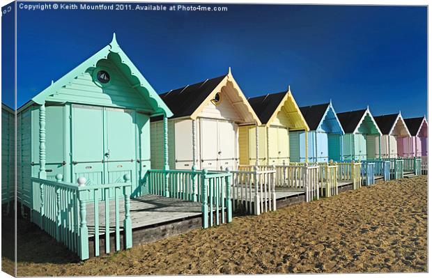 Beach Huts at Mersea Island Canvas Print by Keith Mountford