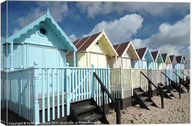 Beach Huts At Mersea Island Canvas Print by Keith Mountford
