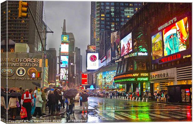 Times Square in the Rain Canvas Print by Iain Mavin