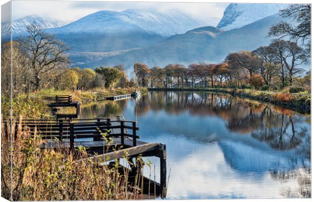 Caledonian Canal and the Nevis Range Canvas Print by Valerie Paterson