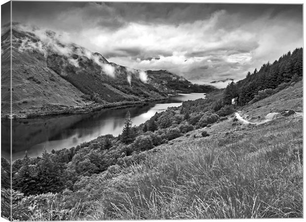 Rain clearing over the loch Canvas Print by Gary Eason
