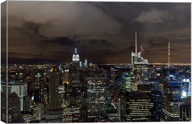New York skyline at night Canvas Print by Gary Eason