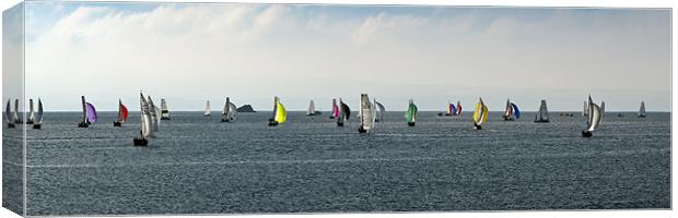 Racing keelboats bound for the start Canvas Print by Gary Eason