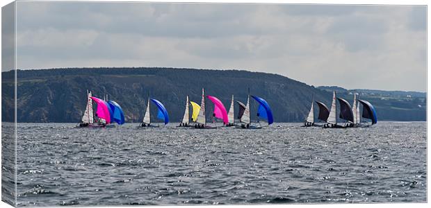 Open 5.70s racing downwind Canvas Print by Gary Eason