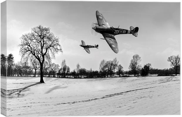 Low-flying Spitfires in winter B&W Canvas Print by Gary Eason