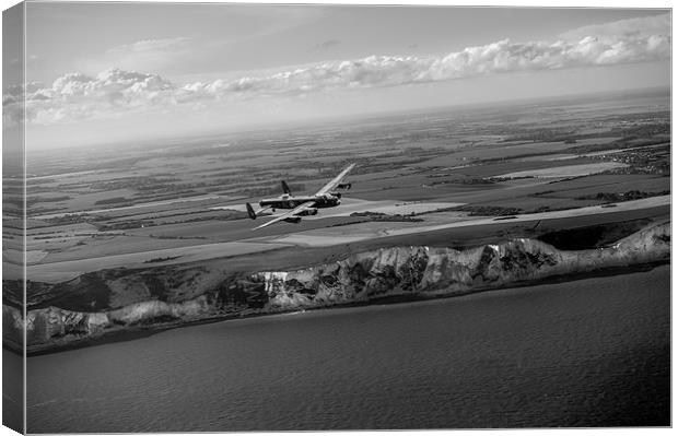 Lancaster over the white cliffs in Kent black and  Canvas Print by Gary Eason