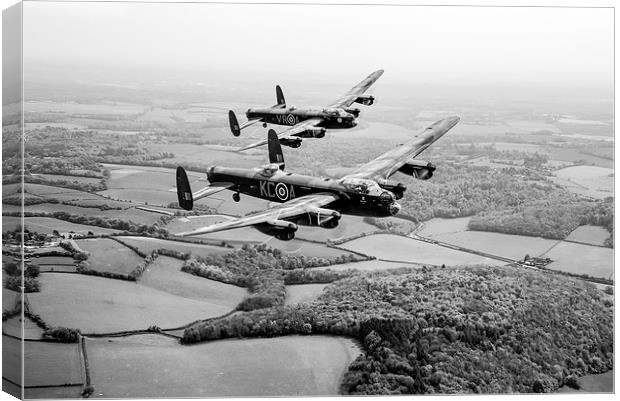 Two Lancs over Bucks black and white version Canvas Print by Gary Eason