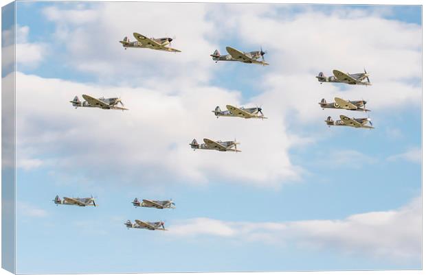 Flying legends: massed Spitfires flypast Canvas Print by Gary Eason