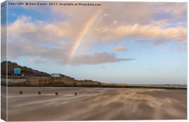 Rainbow over windblown sand on Frinton Beach Canvas Print by Gary Eason
