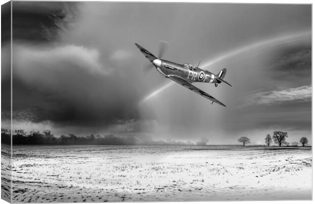 Spitfire with snow shower rainbow, B&W version Canvas Print by Gary Eason