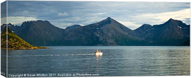 Small fishing boat in Fjords Canvas Print by Derek Whitton